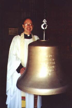 Fr. Alton with the Angelus Bell